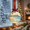 Hawaii beach holiday decoration hanging beside a frosty winter window in soft daylight.