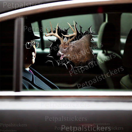 Novelty buck decal placed decoratively on the clean porcelain tank lid of a bathroom toilet.
