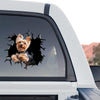 Funny cracked glass Yorkie graphic decal attached to the rear window of a truck.