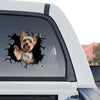 Vibrant Yorkshire Terrier decal displayed on the rear window of a truck parked outdoors.