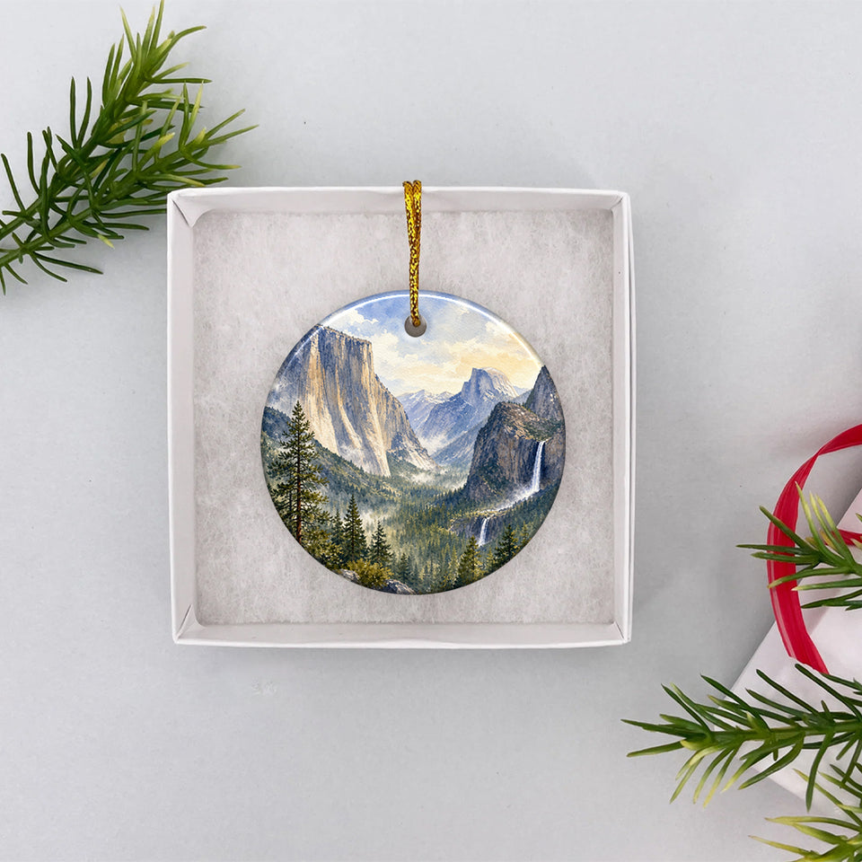Travel keepsake ornament carefully packaged inside an open white gift box.